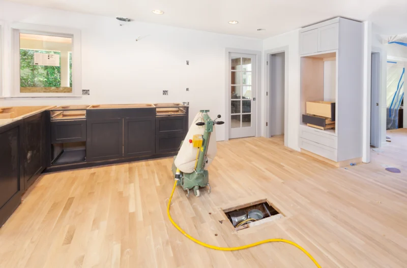 Floor sanding machine in an open plan kitchen